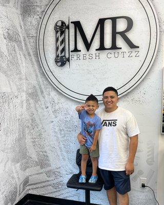 Father & son haircut. Bonding time at the Barbershop and a memorable event for both.