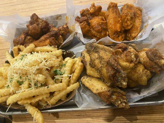 Lemon pepper, Buffalo stampede, and Louisiana rub, with garlic fries