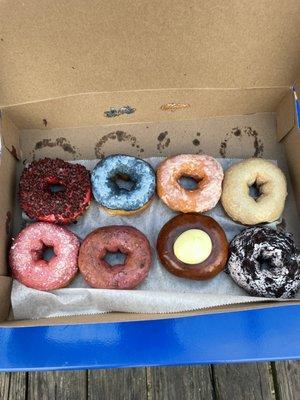 8 donuts total. Half dozen Fruit Flavors. One Boston Cream and one Cookies & Cream