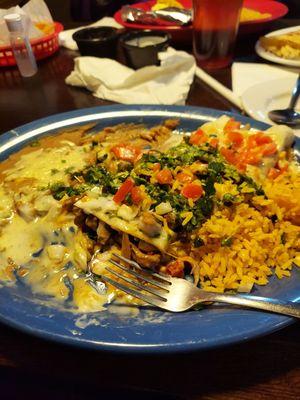 BTO California.  Grilled strips of chicken cooked with onions/tomatoes, covered with melted cheese, rice & beans. It was very good.