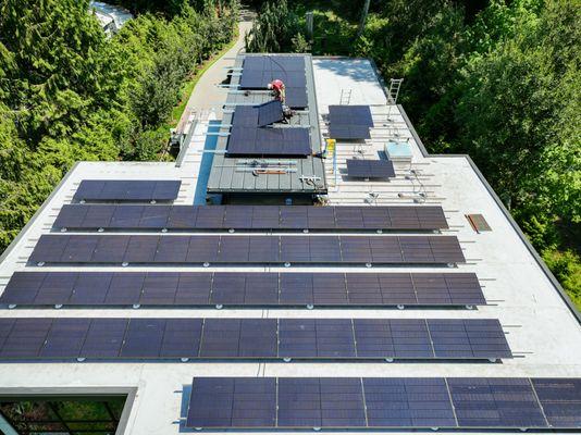 Installing solar on a standing seam metal roof.