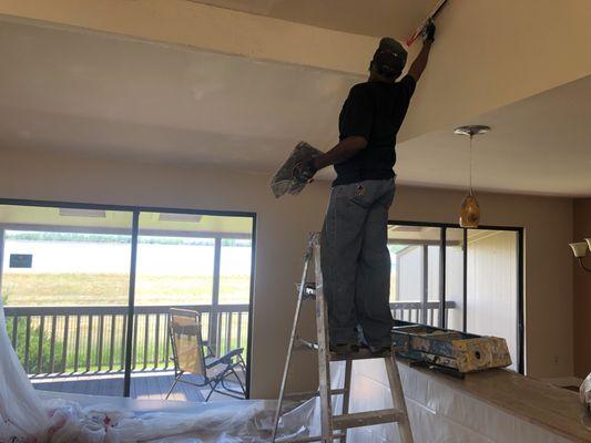 Skim coating a vaulted ceiling, in Castle Pines.