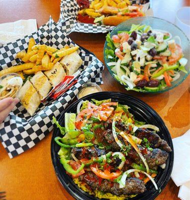 Kofta Bowl (front), Shawerma Sandwich (left), Greek Salad (right)