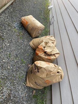 Bags of debris that were forgotten behind.