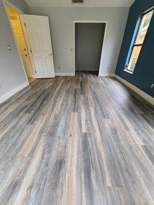 Laminate flooring and baseboards installed by O.j flooring