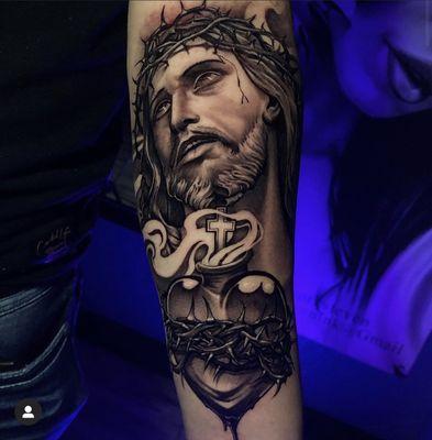 Black and grey Jesus piece