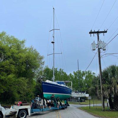 Downed power lines laying across my boat.