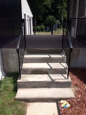 Stair repair concrete form and pour and patch outdoor rug install in breezeway East Hartford Connecticut