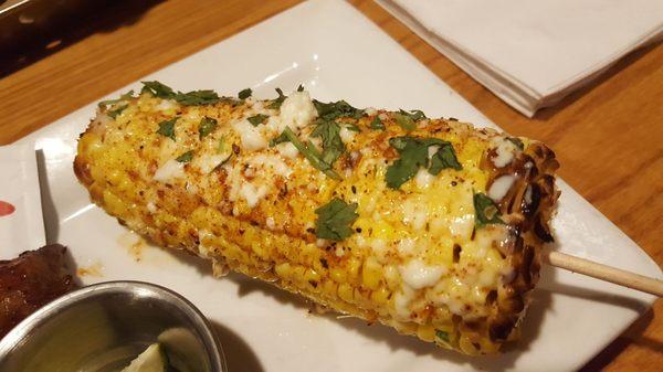 Fried corn that is one of the sides. B