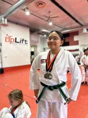 Earned 2 medals at her first Mini Tournament