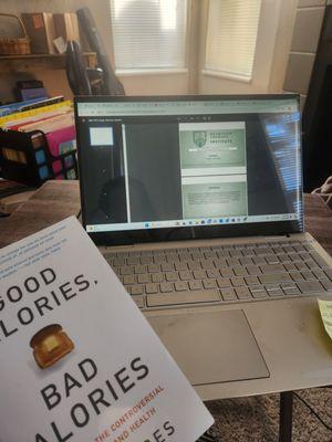 Getting ready for a webinar! And I also bought one of the recommend nutrition books to read during Summer