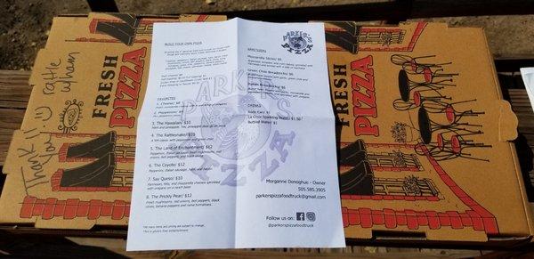 Menu and 2 tasty pizzas