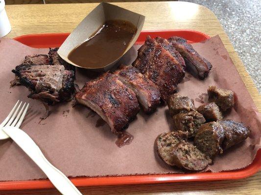 Brisket, ribs and garlic cheddar sausage