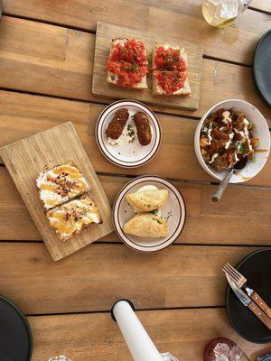 Tapas  Jamón croquetas, pan con tomate, hot honey tosta, patatas bravas