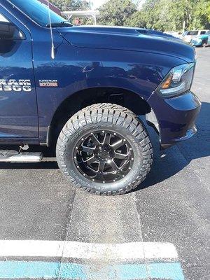 Another happy customer  with a rough country 4 inch lift kit with a rims and tire package  installed