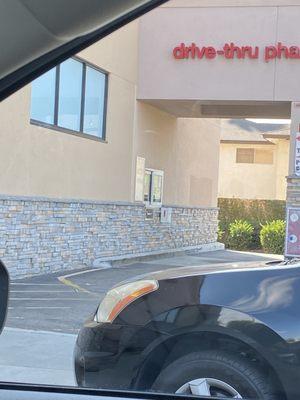 Pharmacy drive thru to get covid test.