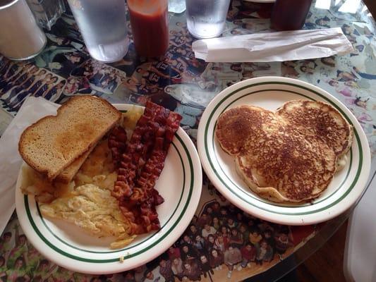 Egg, hash brown, bacon and Mickey Mouse pancake