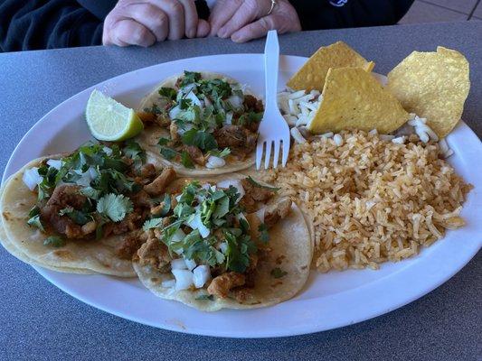 Pastor tacos.  Pastor was good, rice was ice cold.