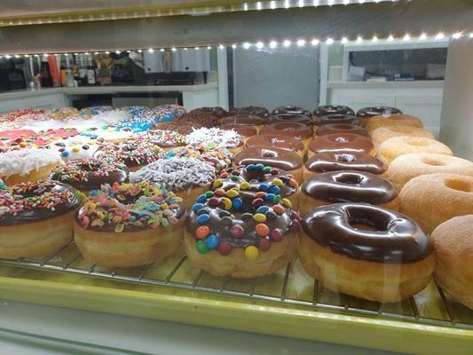 Variety of donuts. Too pretty to even eat