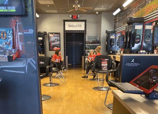 The ladies of sport clips chatting while waiting for my haircut