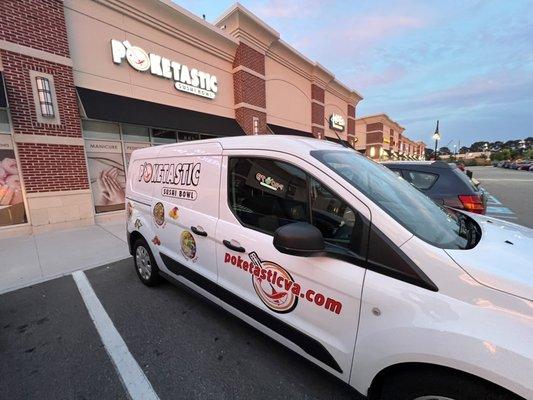 Storefront with delivery van