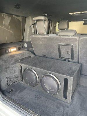 the subwoofer system, newly attached to the car**