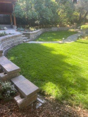 retaining wall with sod installation and walkway