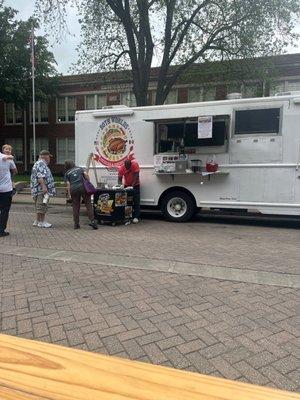 Food trucks in front of Moody Hall