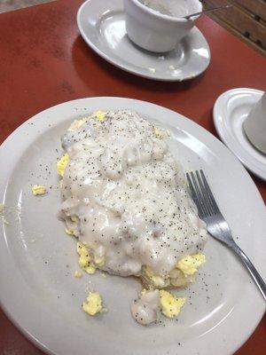 Famous biscuit with sausage gravy and scrambled eggs. DIY