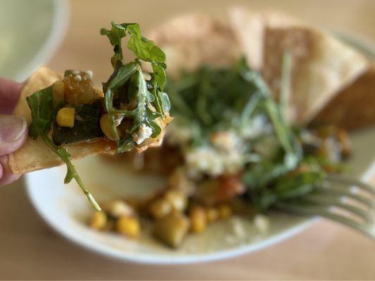 Calabacitas: zucchini, tomatoes, corn and cheese sautéed in onion and garlic