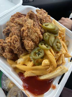 6 piece chicken strips with cheese fries.