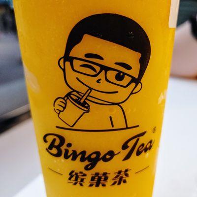 Mango smoothie and close-up of Bingo Tea's happy logo