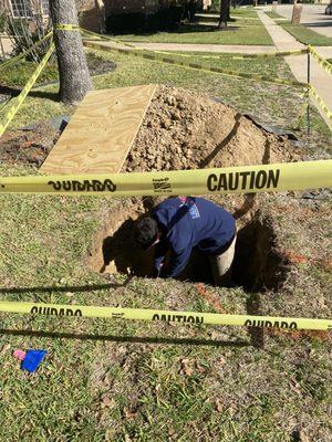 Sewer repair in yard.