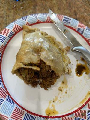 Beef empanada - very good! Note: The oil is from my chimichurri. Just happen to have some on hand.