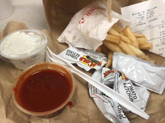 Fries, hot sauce, tzatziki sauce