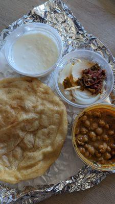 Chana Bhatura , served with yogurt, so good!