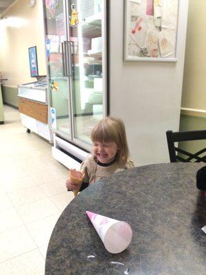 My kid was excited as she finished her cone.