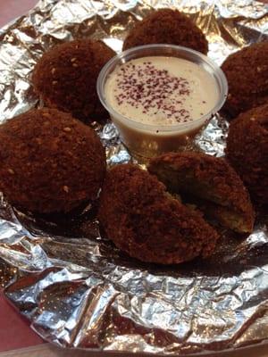 Falafel side with sauce. So delicious!