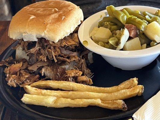 Pork & brisket sandwich with a side of green beans (had minced bacon & cubed potatoes)