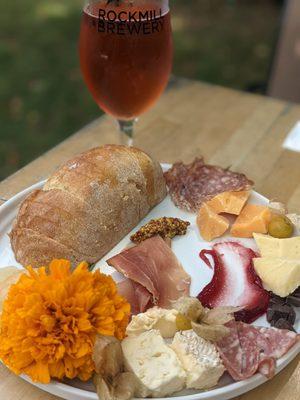 Cheese & charcuterie board (9/18/2021), with a cerise in the background.