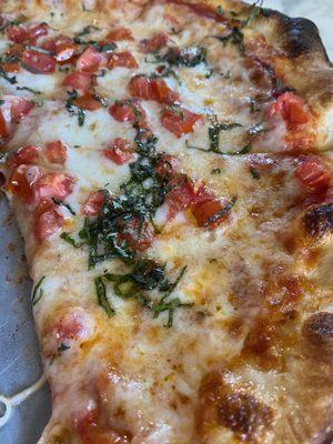 Margarita pizza with fresh tomatoes and Basil