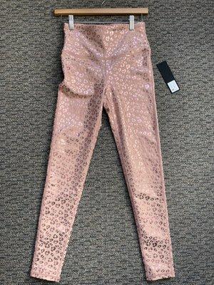 Retail boutique item. Shimmery pink leopard print leggings.