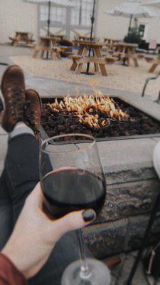 Relaxing by the fire pit with a delicious Cabernet Sauvignon