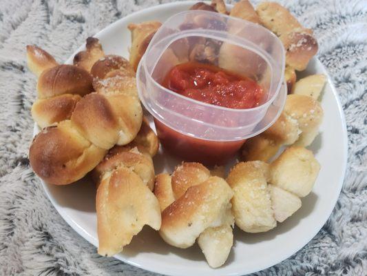 Under cooked, cold, chewy, garlic knots.