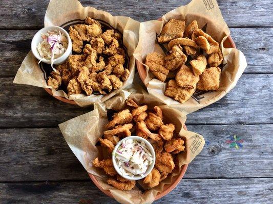 Top: Fried Gulf Coast oysters and drum Bottom: fried Gulf Coast shrimp