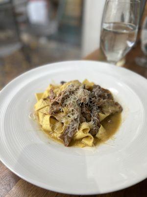 Chicken & Wild Mushroom Pappardelle roasted organic chicken, fresh herbs, truffle oil, parmesan