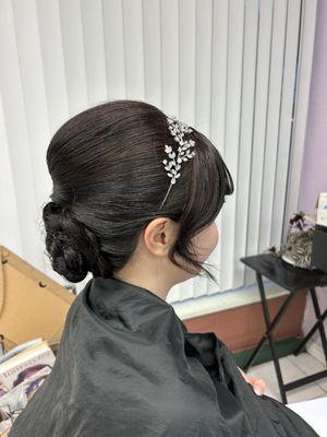 Elegant hair updo by Annie .