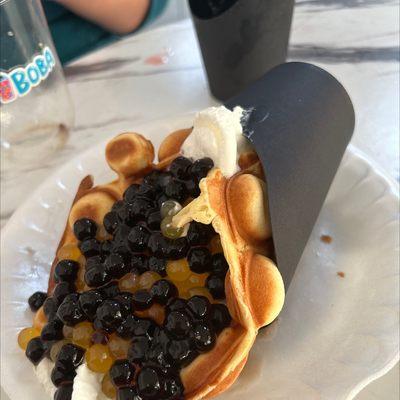 Hong Kong Waffle with whipped cream, peach bursting boba and brown sugar tapioca pearls!