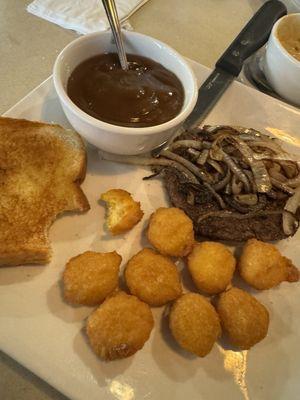 Hamburger and onions with corn nuggets