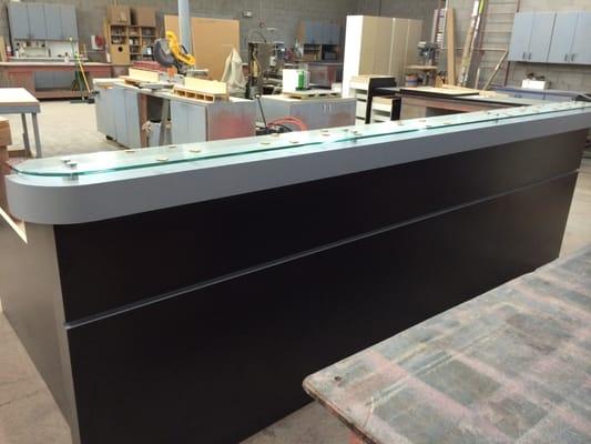 Reception desk with glass and standoffs.